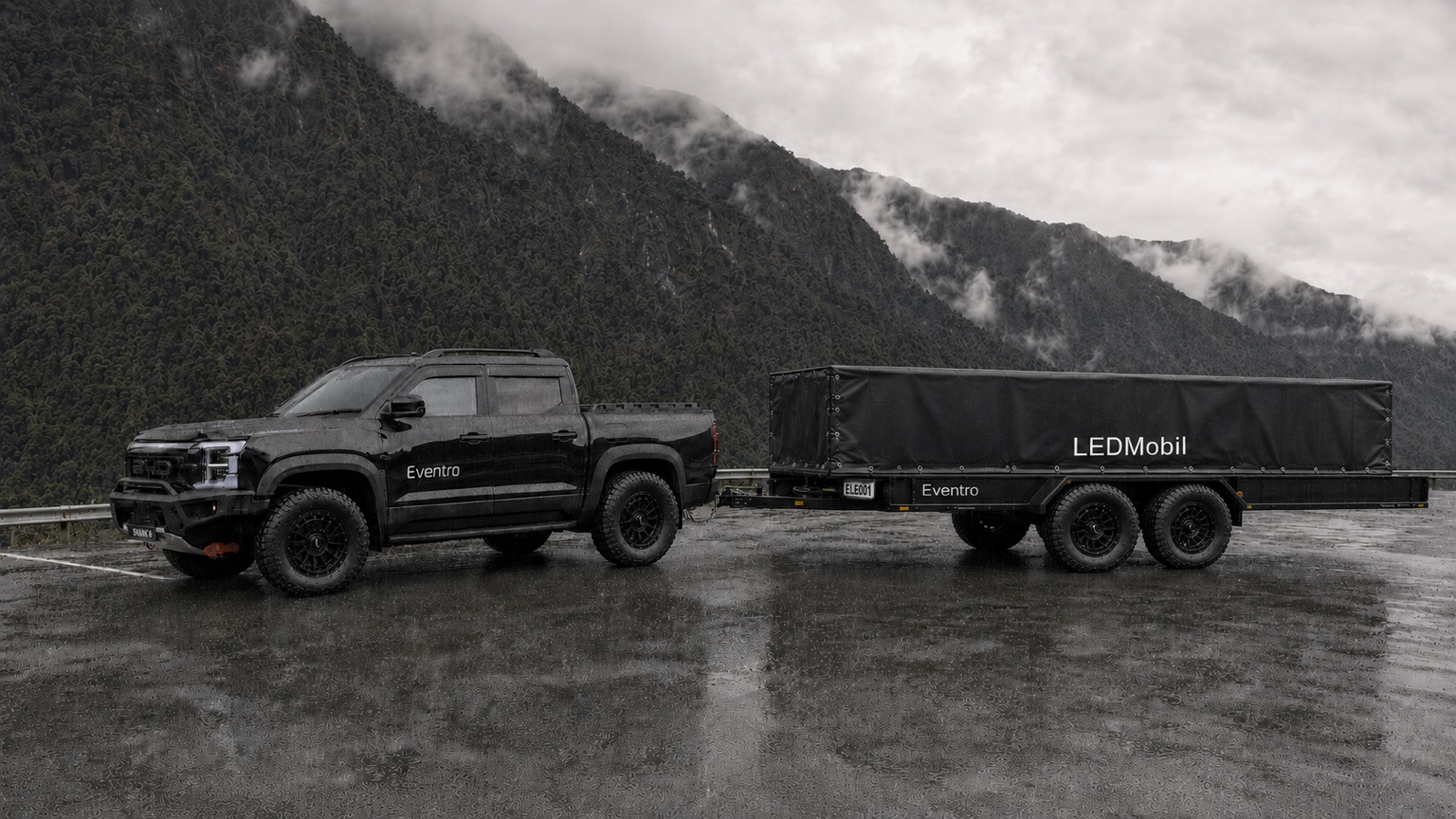 Photorealistic concept render of an Eventro LEDMobil outdoor package in wet conditions